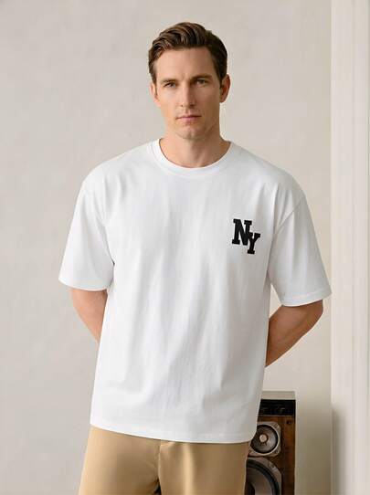 VeloEdit White Color Men's Letter Print Round Neck Casual Summer Short Sleeve T-Shirt Old Money