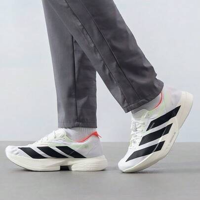 Adidas حذاء أديداس أديزيرو أديوس برو 4 المريح والمتعدد الاستخدامات للجري لمسافات طويلة، للرجال، أبيض