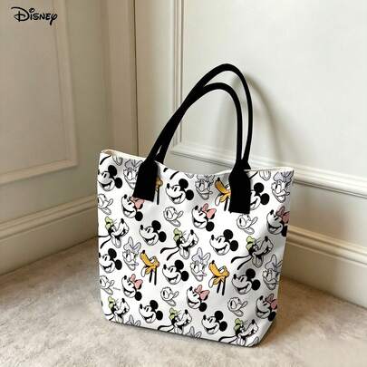 Túi tote vải canvas Disney Mickey Mouse & Friends, in hình mặt các nhân vật khắp bề mặt, thích hợp sử dụng hàng ngày.