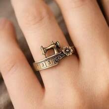 Bộ vòng tay và nhẫn chủ đề máy may - Xem 3