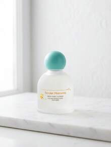 Envase esmerilado, tapa color aqua, diseño sencillo, ilustración infantil. Este perfume resulta perfecto para el uso diario en la infancia, salidas cortas, momentos de relajación en casa o después del baño. - Unitalla - Ver 1