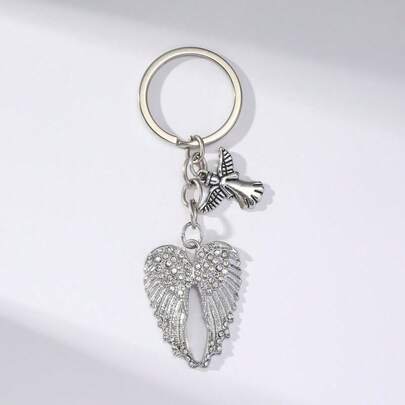 守护天使之翼钥匙扣 - 水钻合金翅膀吊坠，象征着守护与爱，是送给挚爱的有意义的礼物，也是日常佩戴的幸运护身符。