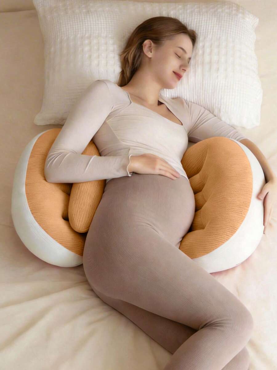 Gối bà bầu hình chữ U tiện dụng - Gối hỗ trợ bà bầu nằm nghiêng với lớp bảo vệ thắt lưng, mang lại sự thoải mái cho vùng bụng và lưng.