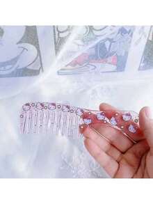 1 pièce Peigne mini mignon Sanrio Katon KT Sanrio à larges dents, doux, pour fille, portable, peigne de maquillage, convient pour un usage quotidien, cadeaux de fête, remplissage de cadeaux et vacances à l'hôtel. Convient pour être transporté partout, peut être rangé dans un sac sans prendre de place. De petite taille et peut être rangé à tout moment. - peigne à cheveux lisses - Voir 12