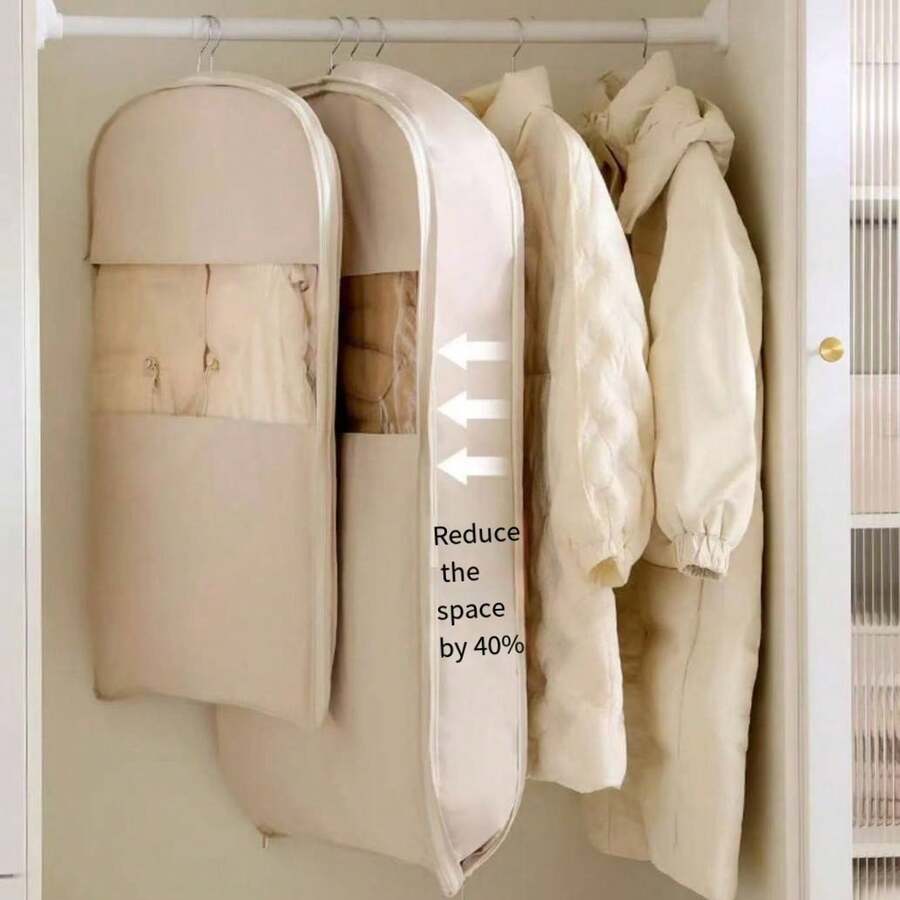 1 chiếc túi đựng áo khoác lông vũ nén chống bụi mới, túi bảo vệ quần áo trong tủ quần áo, túi treo quần áo trong suốt có cửa sổ, được làm từ vải dày dặn giúp tiết kiệm không gian lưu trữ trong tủ quần áo.