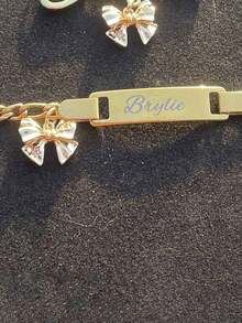 Customized Stainless Steel Laser Engraved Personalized Name Cute Bowknot Bracelet For Girls, Unique Gift Stylish, Fall Fashion, Casual, Cuties, 2000s Fashion Custom Baby Fashion, Tidy, Colorful, Modern, Cute Kawaii Adorable Custom, Unique Treasurefinds, Baby Gifts, Cutebaby, Toddler Fashion Ideal Gifts For Him Family, Friends, Daughter, Son, Her For Children's Day,Multi-Functional,Ornamental,Letter,Stylish,Modern,Colorful,Cute,Adorable,Casual,Custom,Personalised,Unique,Customized,Ideal Gifts For Him,Ideal Gifts For Her - Multicolor - View 4