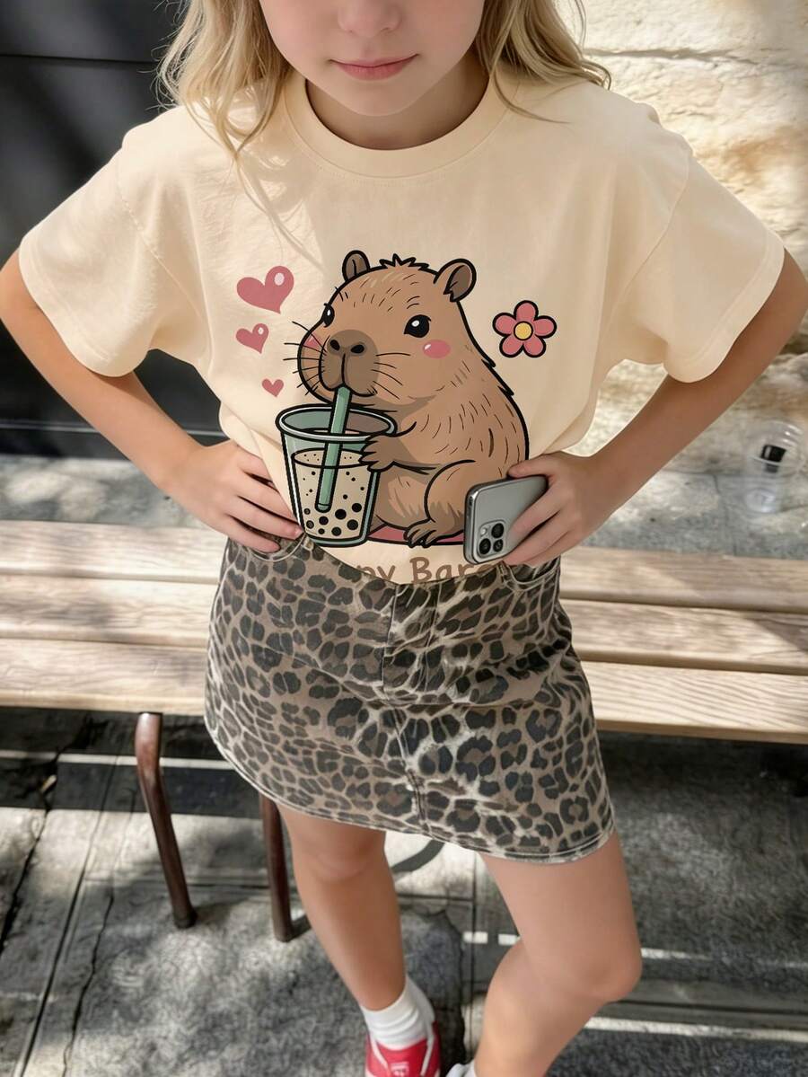少女宽松水豚泡泡印花T恤，柔软舒适可爱街头风夏季上衣 - 杏色 - 查看 1