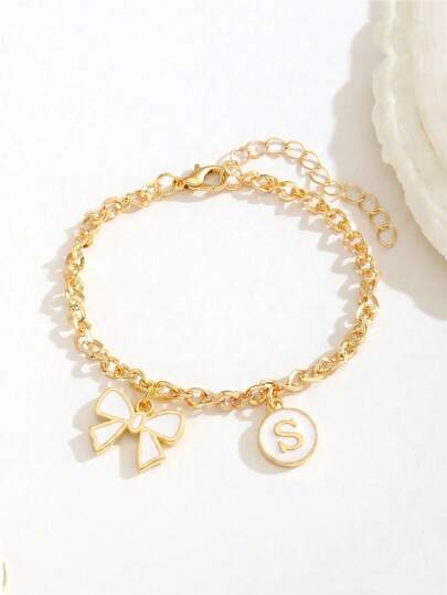 1件精美可爱白色合金蝴蝶结字母吊坠手链，适合儿童、女孩、朋友、姐妹，夏季、海滩、派对、度假、节日、日常佩戴，也是儿童生日礼物的理想选择。