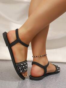 1 đôi sandal quai chữ T màu be đính ngọc trai và đá pha lê, sandal đế bằng sang trọng, chống trơn trượt, phù hợp cho các bạn tuổi teen dự tiệc và mặc thường ngày vào mùa hè. - màu đen - Xem 4