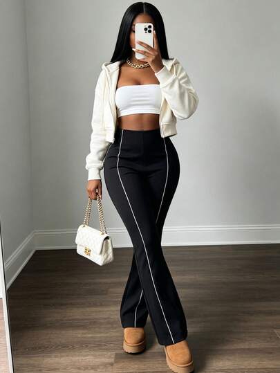 1 chiếc quần ống loe cạp cao màu đen dành cho nữ, thiết kế viền trắng tương phản, dáng ôm tôn dáng, chất liệu vải mềm mại, thoải mái và đa năng, phù hợp cho dạo phố, quán cà phê, môi trường công sở nhẹ nhàng (tạo dáng thon gọn và kéo dài).