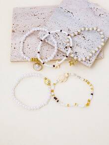 5 pièces Ensemble de bracelets faits main de tortue de mer avec perles de riz pour femmes. Bracelets bohèmes d'été avec coquillages et étoiles de mer. Bijoux de plage quotidiens, cadeaux pour filles - Multicolore - Voir 3