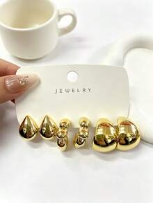 1-8对新款时尚耳环套装，款式多样，包括百合花、水滴形C型、光滑宽C型、纹理水滴形和鸢尾花左右耳佩戴款式，采用树脂材质制成。适合日常佩戴、聚会、派对和生日活动。也可作为礼物赠送给朋友、家人或母亲。 - 金色 - 查看 4