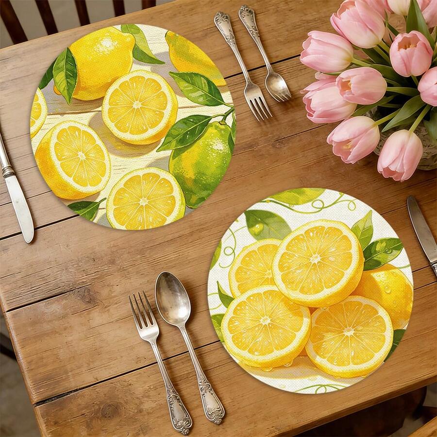A Circular Placemat With Fresh Lemon And Green Leaves As Patterns, Suitable For Use In Spring, Summer, Autumn, And Winter. It Adopts A Multi-Color Pattern Design And Is Woven From 100% Polyester Fiber. The Size Is 15 * 15 Inches And Can Be Machine Washed With Polyester Placemats. - Multicolor - View 1