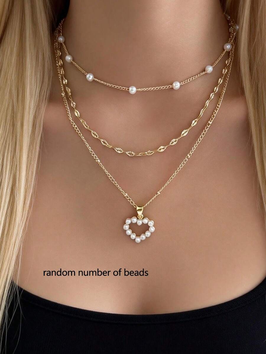 Bộ 2 dây chuyền mặt dây chuyền hình trái tim lãng mạn đính ngọc trai giả, có thể điều chỉnh kích thước, phù hợp cho nữ đeo hàng ngày, hẹn hò, dự tiệc (số lượng ngọc trai ngẫu nhiên). - Vàng - Xem 1