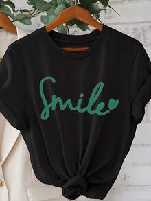 - Women's Round Neck Shirt - With Smile Print In Green Lettering, Thick 220 G/M² Cotton, Casual T-Shirt For Everyday Wear, Washable, Top For All Seasons, Non-Transparent Fabric, Relaxed Fit, Minimalist Design, Breathable Material, Printed Shirt, Streetwear Style. - Black - View 6