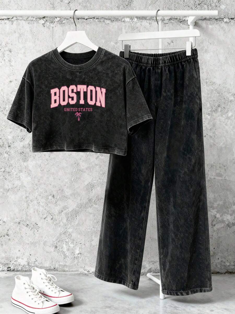 Bộ đồ nữ mùa hè 2026 mới, áo crop top và quần kiểu Y2K, phong cách đường phố retro dáng rộng, kiểu dáng gợi cảm phá cách, chất liệu vải mềm mại thoải mái được xử lý bằng enzyme, bộ đồ thường ngày chất lượng cao màu đen thanh lịch. - màu đen - Xem 1