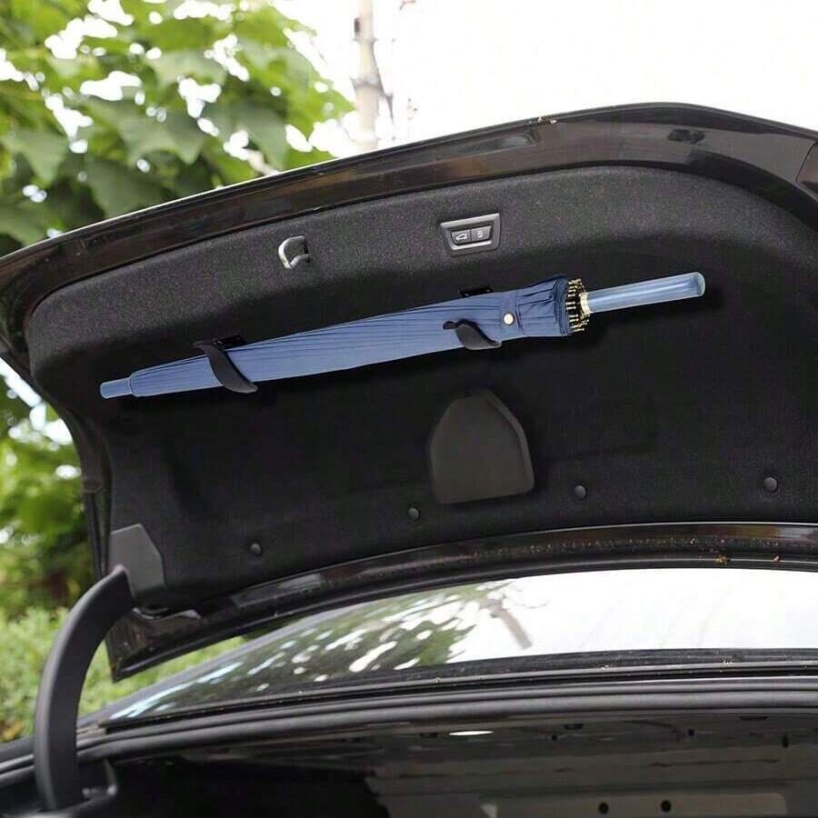 1 pieza/2 piezas Gancho para coche, gancho para respaldo de asiento, soporte multiusos para paraguas y almacenamiento de paraguas en el maletero del coche - A - Ver 1