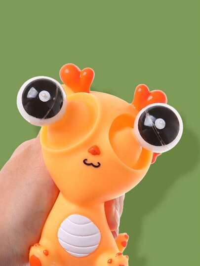 挤压式弹出龙，挤压式大眼龙雕塑，挤压式弹出龙钥匙扣，派对礼品