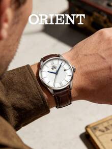 Orient Đồng hồ nam cơ tự động, mặt số trắng bạc có vân với chữ số La Mã, kim thép xanh, dây da nâu, đồng hồ đeo tay cổ điển thanh lịch, món quà tuyệt vời cho lễ tốt nghiệp, đám cưới. - Nâu đậm - Xem 2