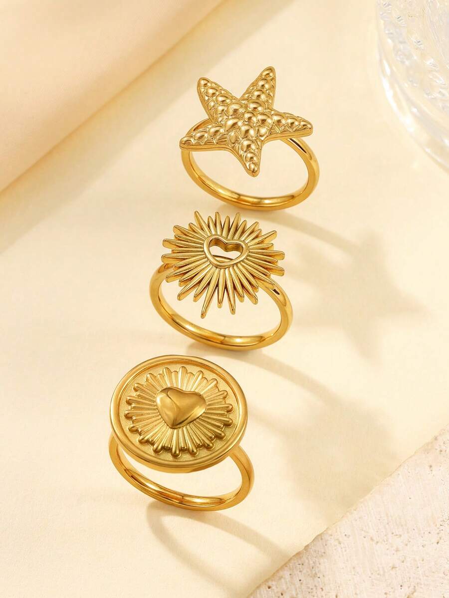 三件套不锈钢镀金时尚简约戒指套装，包含海星、璀璨爱心等造型，适合女性佩戴或作为礼物赠送。 - 金黃色 - 查看 1