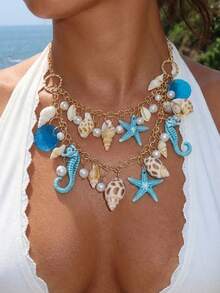 一件夏季海滨贝壳饰品，包含贝壳、海星、珍珠、锁骨链和串珠海洋饰品。 - 彩色 - 查看 8