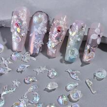 3D极光海洋美甲装饰套装，包含贝壳、海星、海螺、棕榈树、美人鱼尾巴和银珠 - 闪亮AB树脂美甲装饰品，适用于亚克力指甲、手机壳、树脂工艺品、珠宝和夏季海滩美甲，是美甲沙龙和DIY美甲爱好者的理想之选。 - 彩色 - 查看 4
