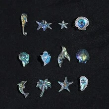 3D极光海洋美甲装饰套装，包含贝壳、海星、海螺、棕榈树、美人鱼尾巴和银珠 - 闪亮AB树脂美甲装饰品，适用于亚克力指甲、手机壳、树脂工艺品、珠宝和夏季海滩美甲，是美甲沙龙和DIY美甲爱好者的理想之选。 - 彩色 - 查看 3
