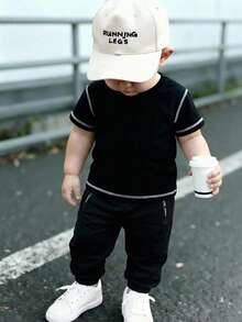 2pcs/Set Toddler Boys' Casual Solid Color Contrast Stripe Short Sleeve Loose T-Shirt And Long Jogger Pants, 4-7 Years Old, Spring/Summer/Autumn - Black - View 1