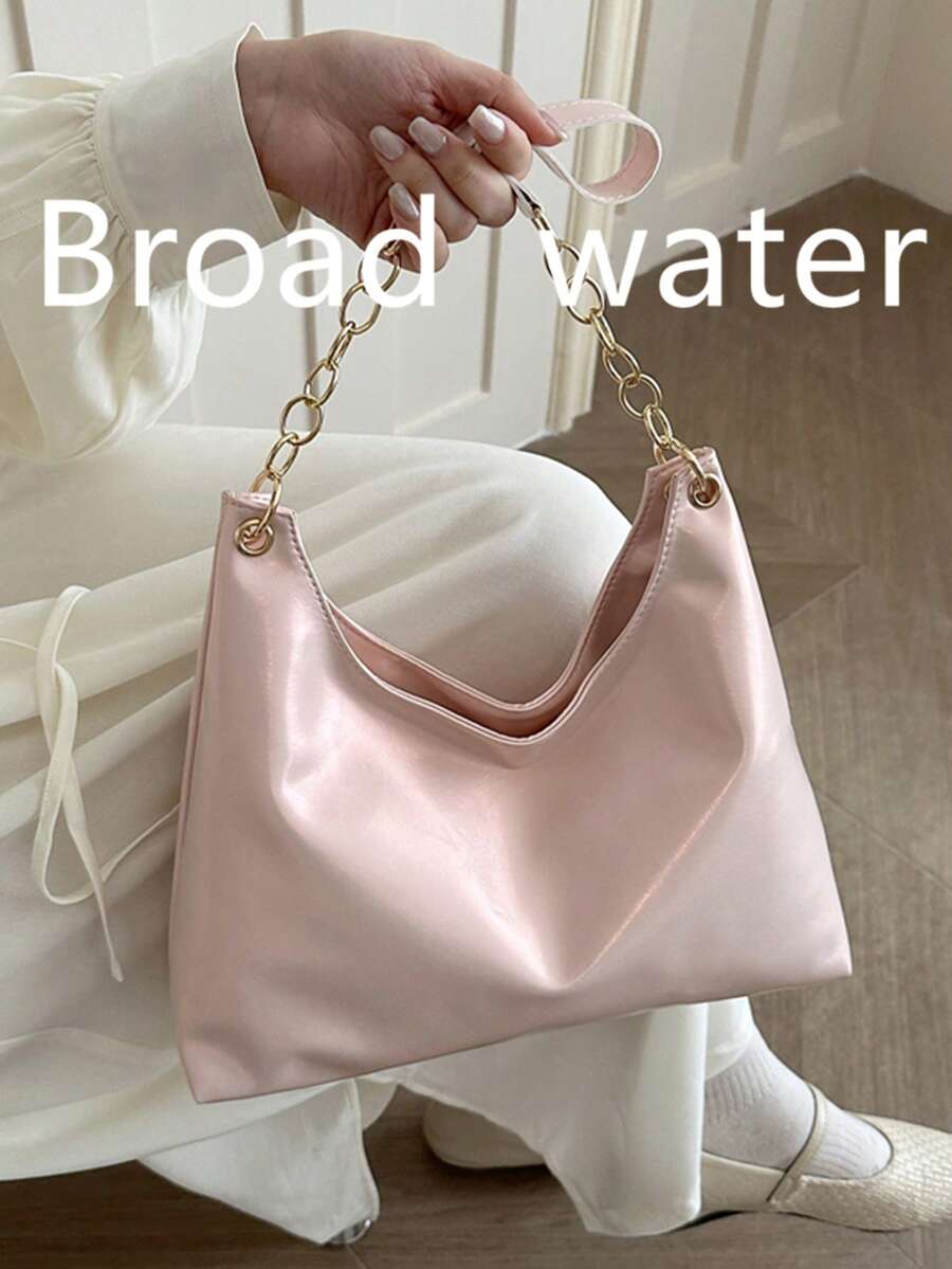 2026新款复古新月形真皮斜挎包，简约百搭小号女士单肩包