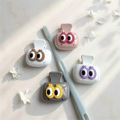 Cute Toothbrush Holder With Big Eyes, Available In Black, Gray, White And Pink. The Compact And Lightweight Toothbrush Holder Can Perfectly Protect Your Toothbrush Head And Is Convenient To Carry.