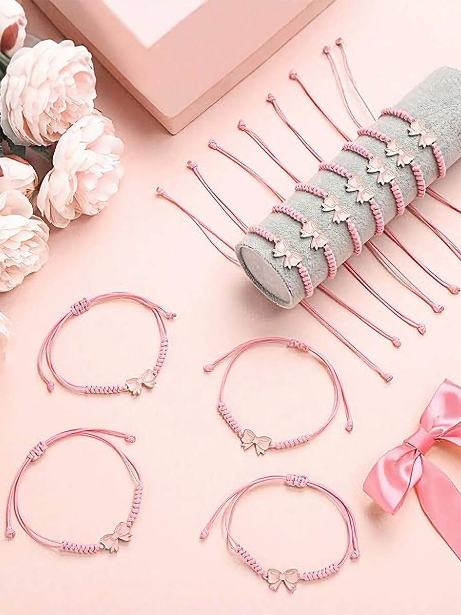 6 piezas Pulseras trenzadas con moño lindo, regalos ajustables de cuerda para animadoras, damas de honor, fiesta de cumpleaños, adecuado para equipo de baile de animación de amigos - rosa - Ver 1