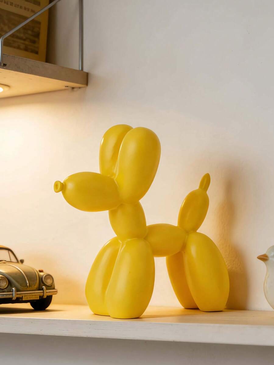 This Yellow Balloon Dog Sculpture Is A Modern Home Decor Piece With A Stylish Design, Perfect For Placement On A Coffee Table Or In The Kitchen, And It Blends Well With The Room's Color Scheme. It Also Makes An Excellent Holiday Gift For Decorating A Desk Or Bookshelf.