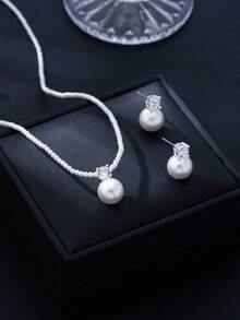 Bộ 3 món gồm dây chuyền hạt ngọc trai trắng và bông tai hình trái tim, bộ trang sức ngọc trai độc đáo chất lượng cao, quà tặng Ngày của Mẹ. - Hình tròn màu trắng - Xem 4