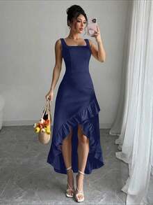 Vestido de tirantes para mujer, de color azul marino con acabado satinado.Cuello cuadrado y cintura ajustada, falda asimétrica con volantes (corta adelante y larga atrás).Diseño favorecedor y sofisticado, ideal para eventos, fiestas y ocasiones especiales. - Azul marino - Ver 8