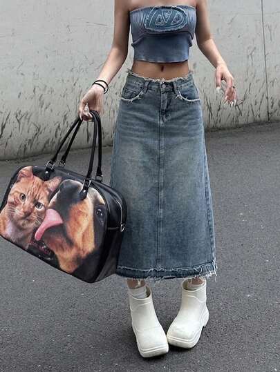 Chân váy chữ A bằng vải denim cổ điển, dáng suông rộng rãi, tôn dáng người quả lê.