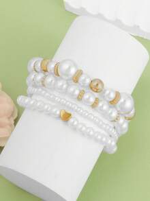 Bộ 4 vòng tay thời trang co giãn hình trái tim và đính ngọc trai, phong cách tối giản. - A - Xem 4