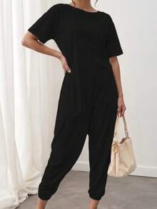 Enterizo mono jumpsuit mujer dama  manga corta cuello redondo corte relajado color lila bolsillos laterales tejido suave cómodo estilo casual moderno versátil para uso diario    Bolsillo  aberturas - Negro - Ver 2