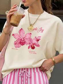 Conjunto casual de verano para mujer talla grande, con top de cuello redondo con estampado de orquídeas rosas y shorts a juego con rayas rosas, perfecto para vacaciones y elegancia veraniega - Multicolor - Ver 4