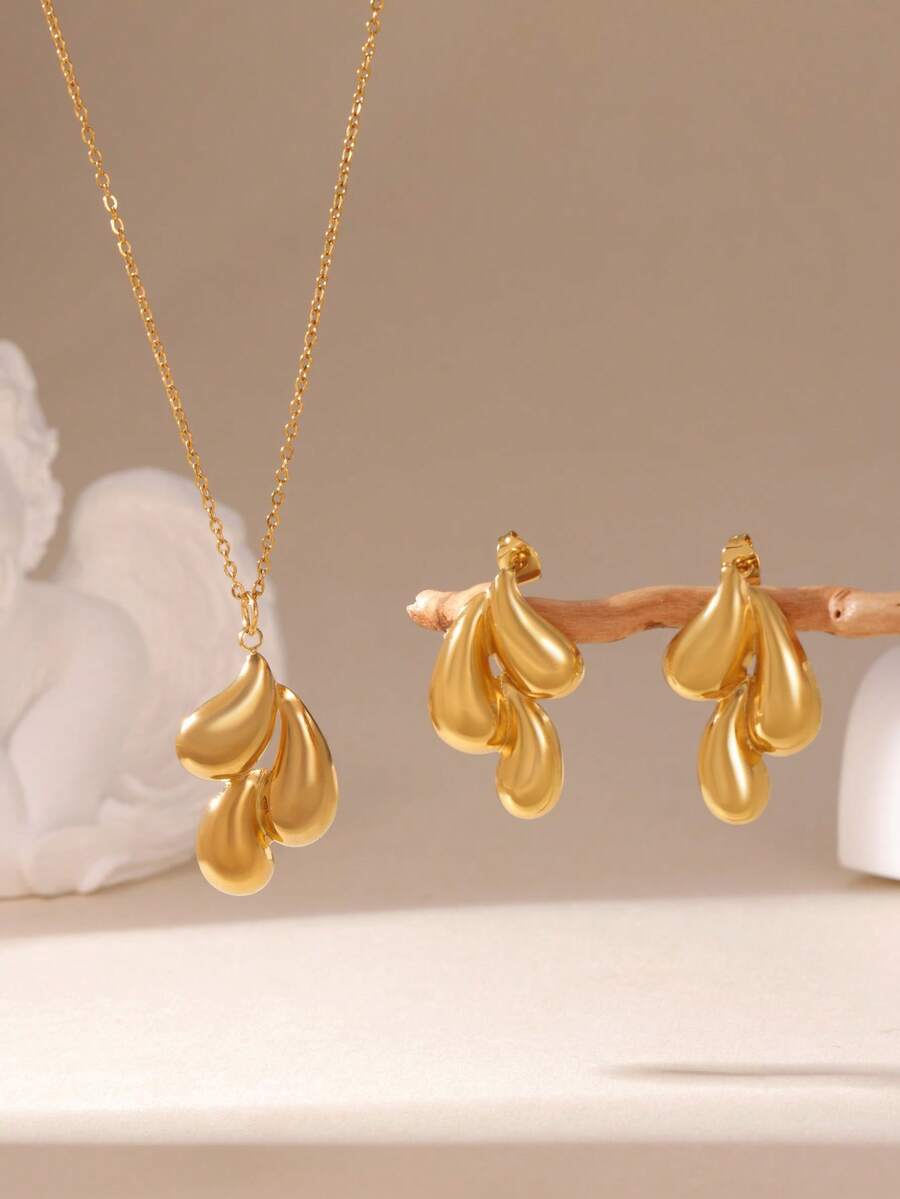 Bộ trang sức 3 món tối giản bằng thép không gỉ gồm bông tai và dây chuyền hình giọt nước, mạ vàng 18K, chống thấm nước và chống gỉ, phù hợp cho cả nam và nữ, thích hợp sử dụng hàng ngày hoặc trong những dịp đặc biệt. - Nhiều màu - Xem 1