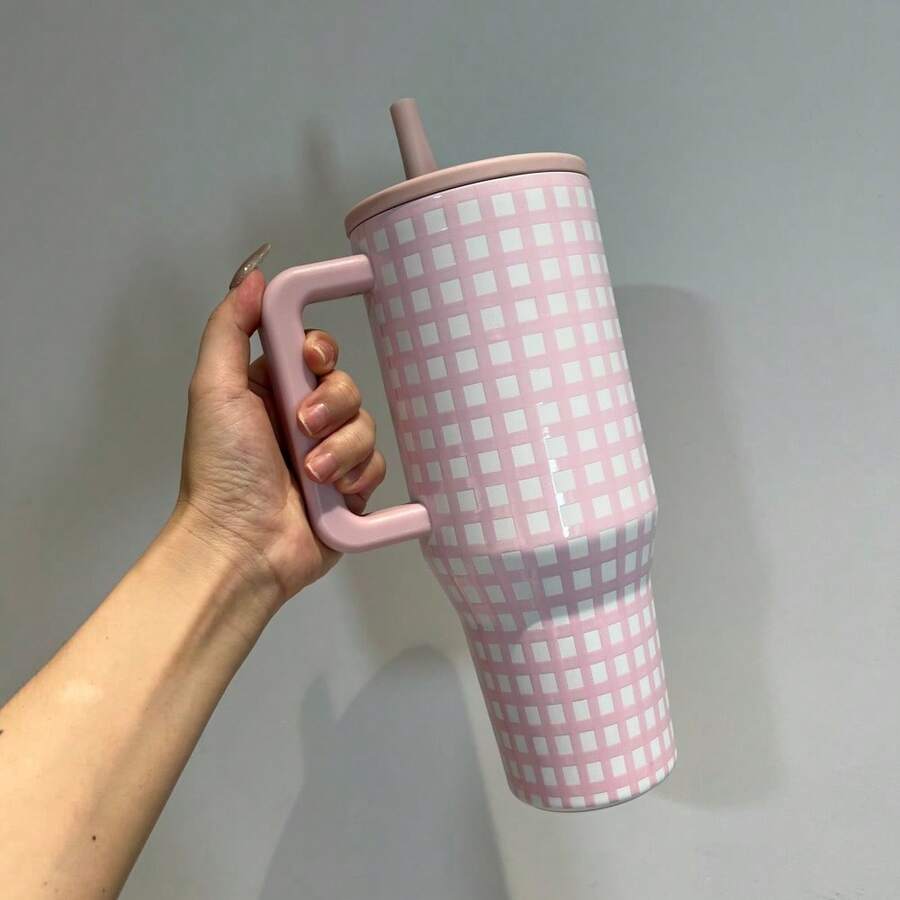 HYDROO-JUGG, 40 Oz, Powder White/Black/Caffeine, Insulated Cup Ice Booster Cup, Mug Water Cup, Great Gift Item. Three Patterns Of Checkered Designs, With Perfect Appearance. The Powder White Pattern Has A Soft And Cute Girlish Charm, The Black And White Pattern Is Versatile, And The Coffee Pattern Is Retro And Elegant. The Vacuum Insulation Layer Design Effectively Locks In Temperature And Freshness. It Keeps Drinks Frozen In Summer And Warm In Winter. The Non-Slip Handle Fits The Hand Shape, Providing A Comfortable Grip. The Leak-Proof Sealing Cover Is Tightly Attached, The Straw Is Detachable, Making Cleaning Convenient. It Doesn't Leak And Is More Secure To Carry. The 40 Oz Large Capacity Is Suitable For Students, Office Workers, Fitness Enthusiasts, And Can Be Used In Various Scenarios Such As In Cars, At Work, At Home, And Outdoors. It Is Practical And Highly Stylish For Gift Giving During Festivals. - Pink and White Checkered - View 1