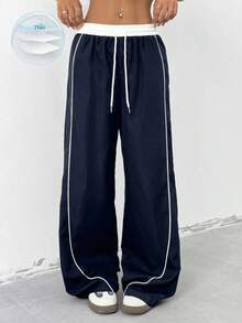 Pantalón Jogger Deportivo Azul Marino, Cintura Contraste Blanco Con Cordón, Diseño De Rayas Blancas Laterales, Contorno Favorecido De Caderas, Corte Amplio Holgado De Pierna Ancha, Tejido Suave Algodón, Estilo Urbano Streetwear Casual Juvenil - Azul marino - Ver 2