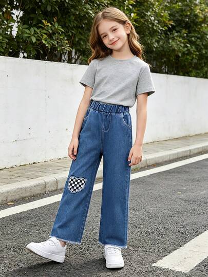 Pantalon décontracté pour préadolescentes avec application de cœur et ourlet effiloché