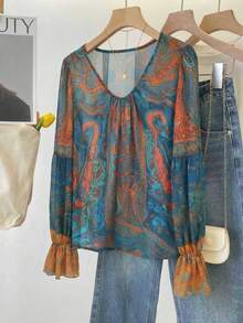 Áo kiểu voan in họa tiết Paisley mới năm 2026, cổ chữ V, thắt nơ phía trước, dáng rộng, tay loe, phong cách bohemian, tay dài, phù hợp cho lễ hội âm nhạc, và cả những dịp nghỉ mát với người có vóc dáng mũm mĩm. - Nhiều màu - Xem 9