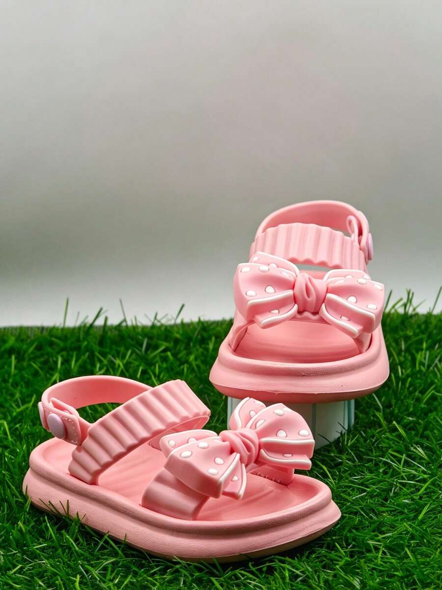 1 đôi dép xăng đan mùa hè đa năng cho trẻ em, trang trí nơ dễ thương, nhẹ và thoáng khí, dễ mang vào và tháo ra, phù hợp cho bé gái hoạt động ngoài trời và hàng ngày trên bãi biển.