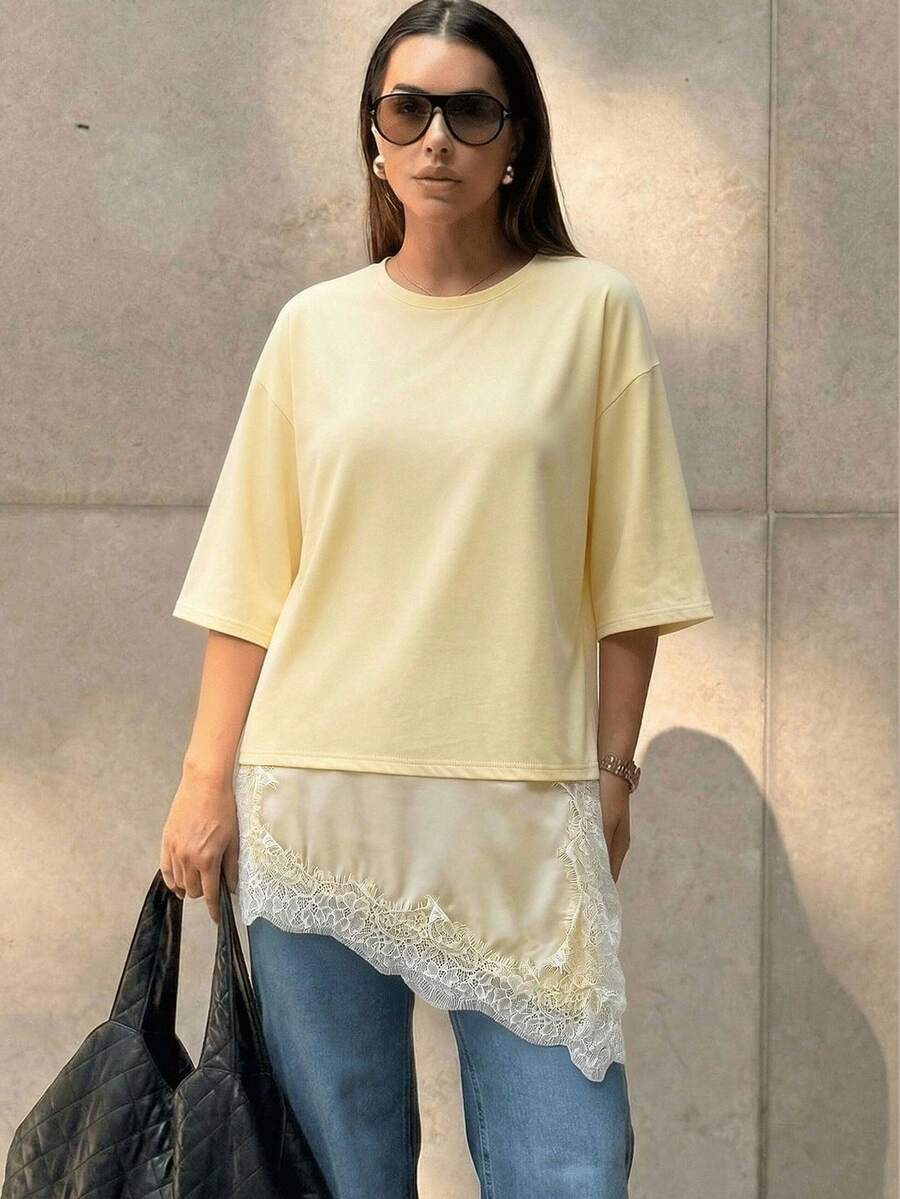 2026 Camiseta casual de verano para mujer con elegante encaje vintage y bajo asimétrico, moda de calle con cuello redondo y manga corta para primavera