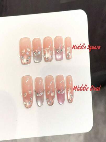10片方形/椭圆形手工按压式美甲贴片，裸粉渐变猫眼手绘铃兰图案，点缀春夏，适合派对和日常佩戴。适合女孩和女士参加节日派对、音乐节和日常佩戴，也是情人节、母亲节的理想礼物。