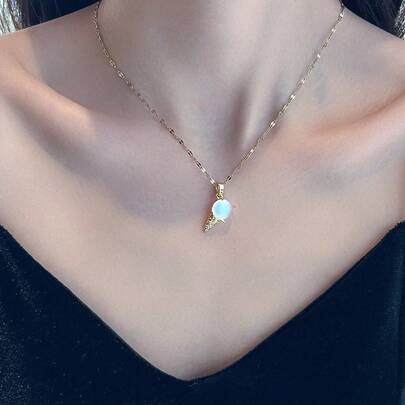 1 chiếc vòng cổ hình kem không phai màu, kiểu dáng độc đáo, nhỏ nhắn, trong suốt, màu mới, làm bằng thép mạ vàng titan, thiết kế khóa cài, mặt dây chuyền, thích hợp cho mùa hè và đi biển, dành cho nữ.