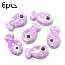 Bộ 6 hạt gốm hình cá chấm bi nhiều màu sắc, kích thước 11x19mm, hai mặt, dùng để làm vòng tay, vòng cổ, trang sức, phụ kiện điện thoại, móc khóa. - Hạt cườm hình cá chấm bi - Xem 24