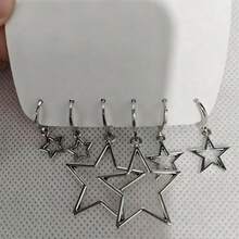 Set de 3 pendientes de clip con estrella hueca plateada. Adoptando un diseño minimalista, con diferentes tamaños, adecuado para varios estilos. Diseño exquisito, versátil para uso diario, evitando conflictos de estilo. - Plateado - Ver 2