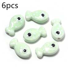 Bộ 6 hạt gốm hình cá chấm bi nhiều màu sắc, kích thước 11x19mm, hai mặt, dùng để làm vòng tay, vòng cổ, trang sức, phụ kiện điện thoại, móc khóa. - Hạt cườm hình cá chấm bi - Xem 25